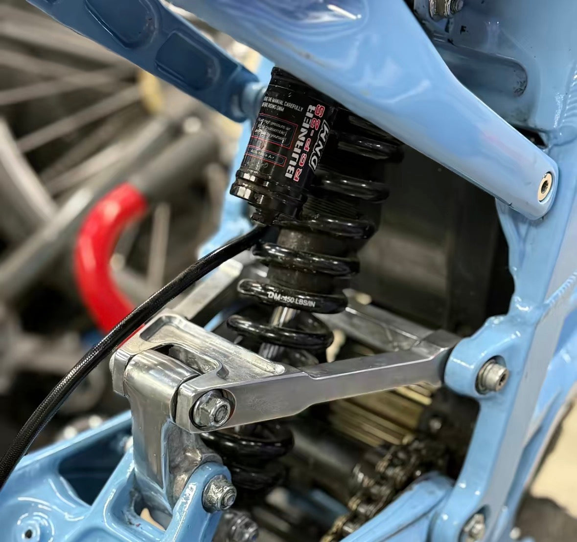 Surron Lbx chrome linkage and triangle kit